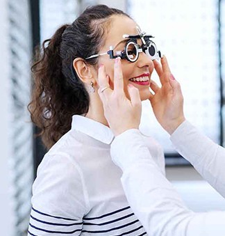 Woman recieving a comprehensive eye exam
