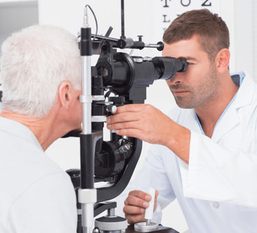 Patient getting an eye exam at One Hour Optical in West Des Moines